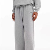 NOAH MARS Cross Logo Embroidered Micro Flared Sweatpants Men Casual Sports Pants