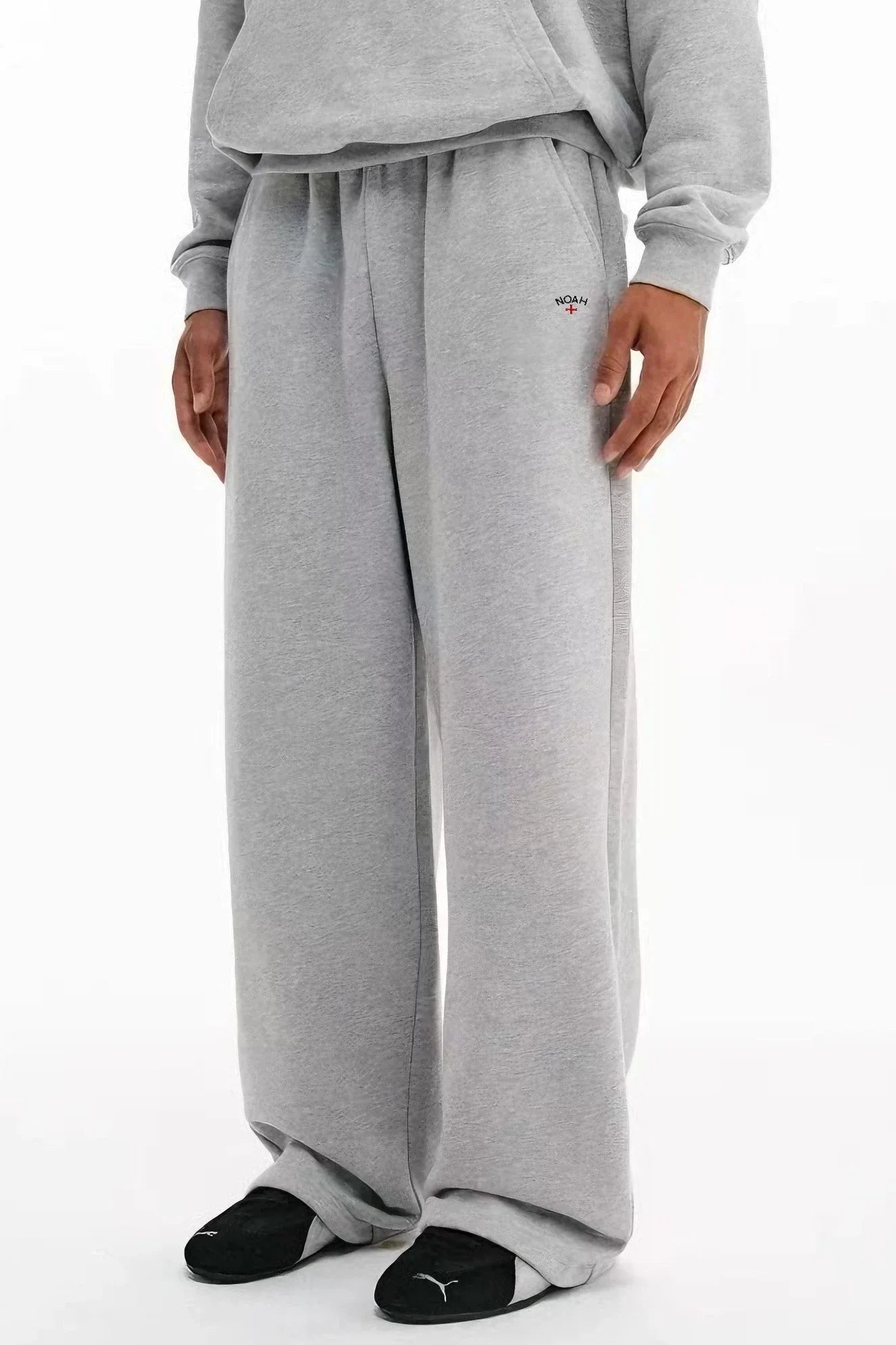 NOAH MARS Logo Embroidered Cross-Shape Micro Flared Pants